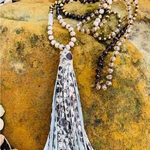 Pretty snakeskin tassel and faceted bead necklace